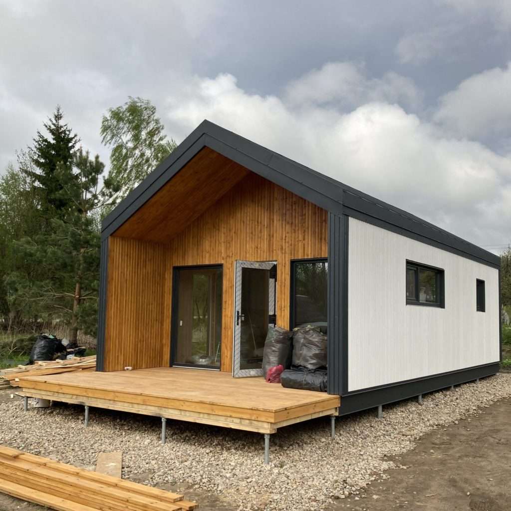 Moduļu māja ar infrasarkano staru plēvi mērogotā e1623326211731